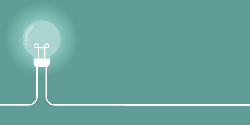Bulb vector in white against a light teal background 
