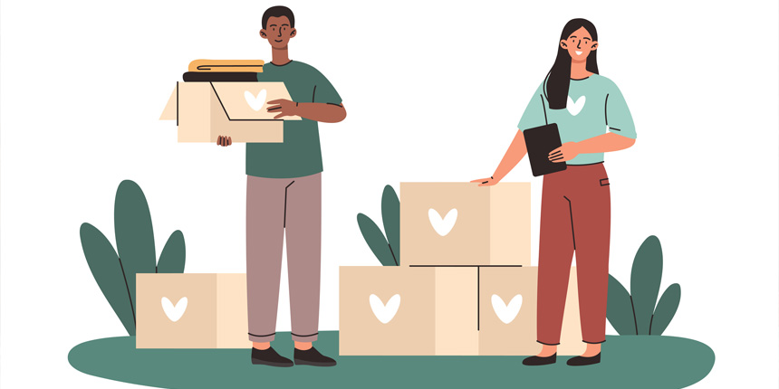 People packing boxes ready to donate